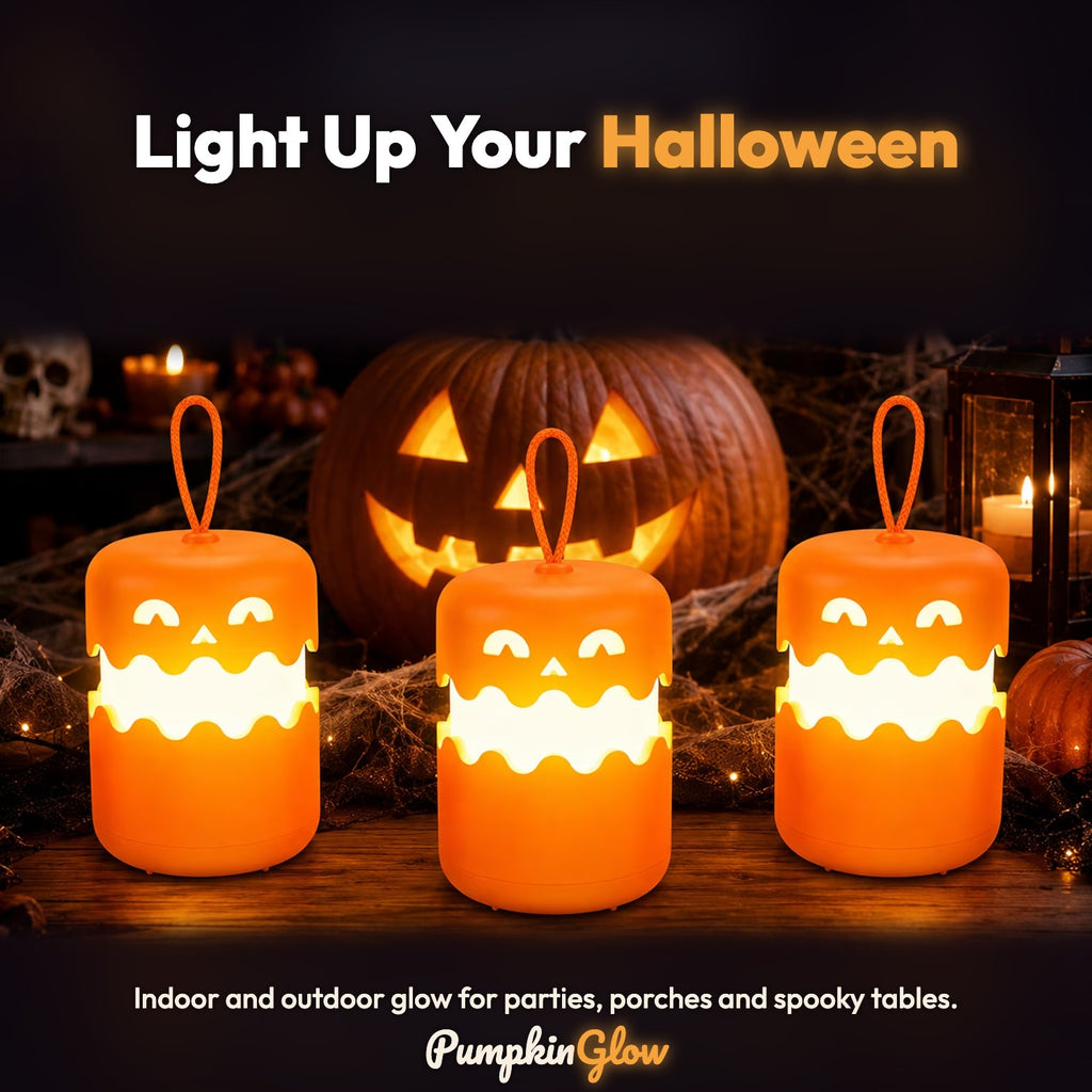 PumpkinGlow lanterns on a Halloween table with carved pumpkins